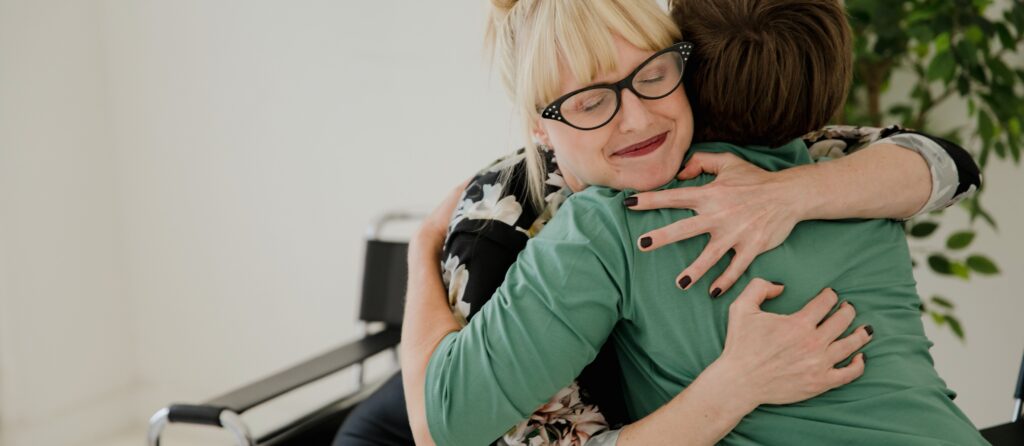 women hugging